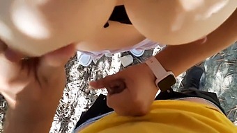 Big-Titted Cougar Gives A Blowjob In Nature