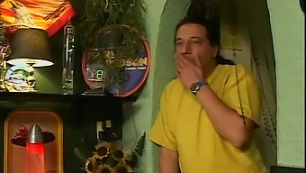 Two Men Pleasure A Blonde Woman In A Bar